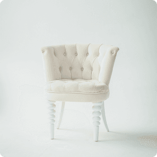 White tufted chair